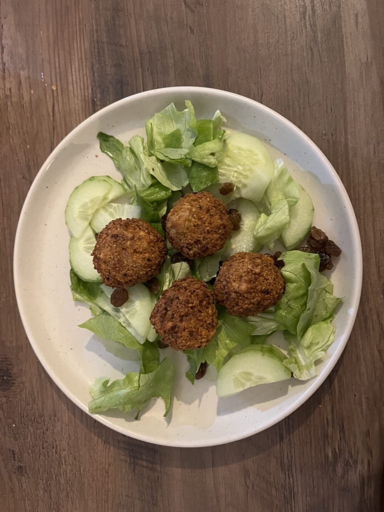 Falafel on top of a salad